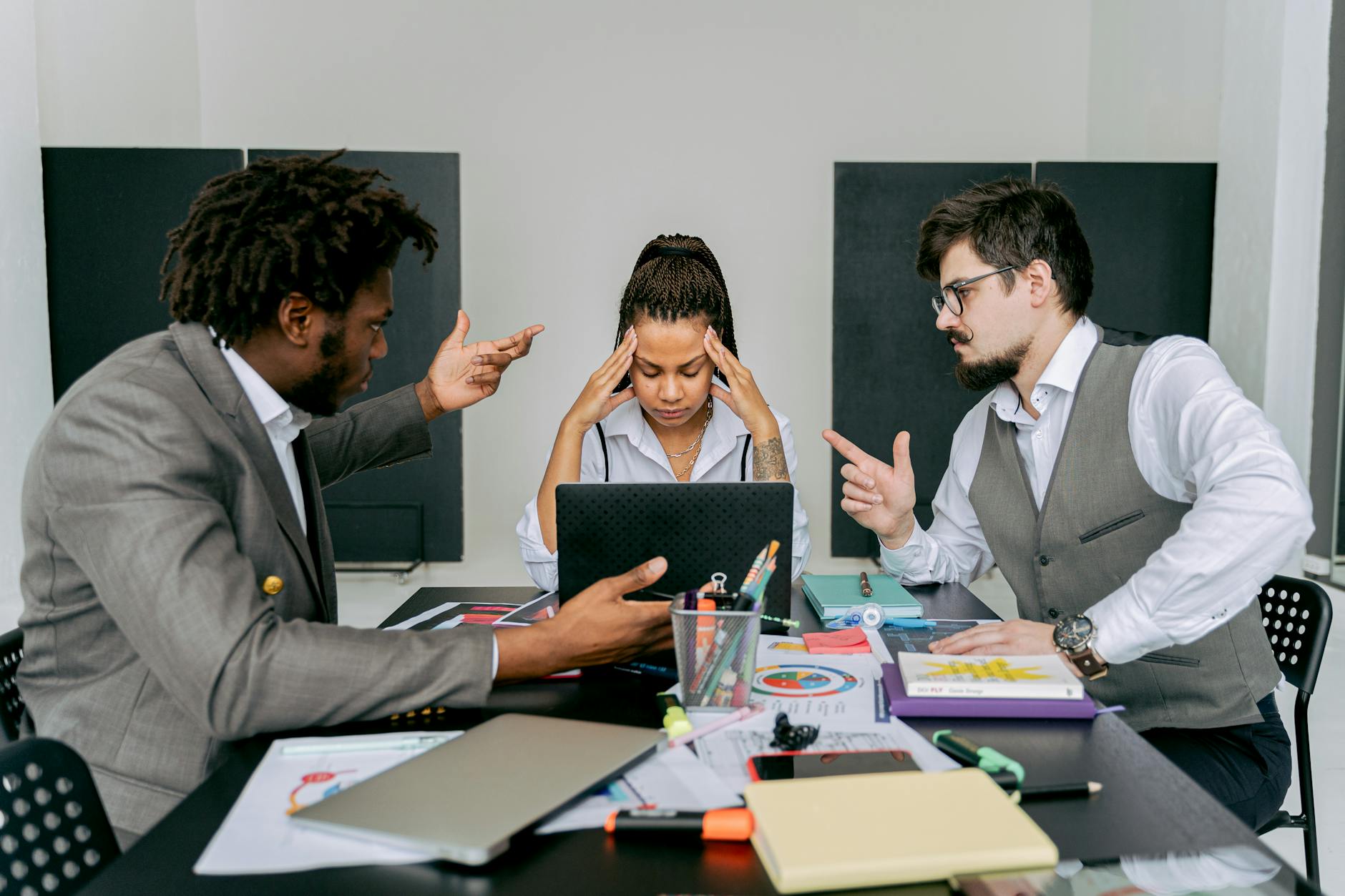symmetrical image of people arguing in an office